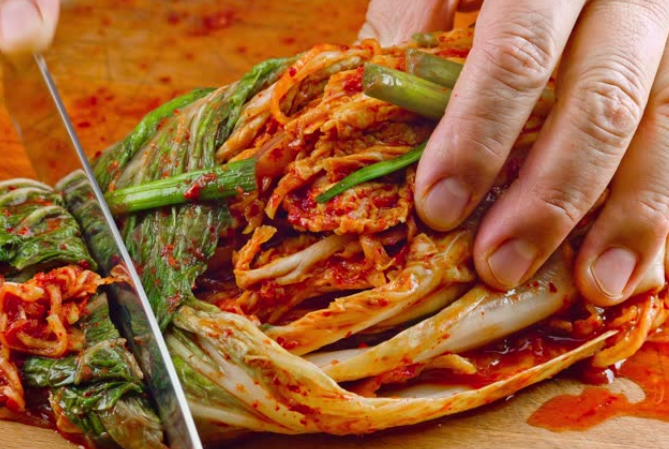 Kogi-Inspired Korean BBQ Hot Dogs with Kimchi Slaw