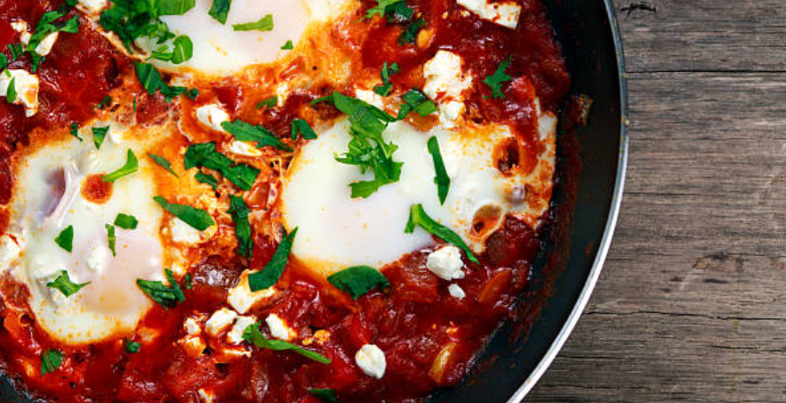 Fiery Eggs in Purgatory: Spicy Tomato-Poached Eggs for Breakfast Bliss
