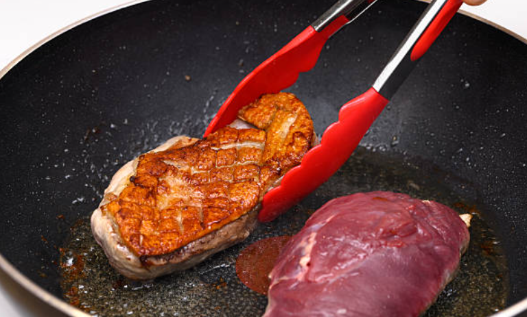 Elegant Sliced Duck Breast with Sweet Cherry Sauce