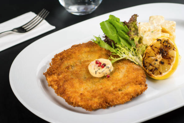 Crispy Pork Schnitzel with Zesty Lemon Butter Finish